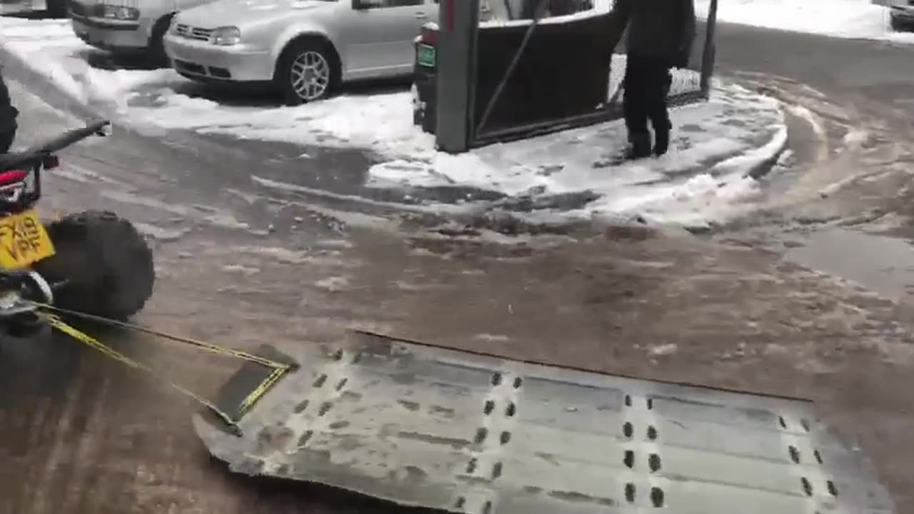 Tim on Quad - improvised sled from a VW t6 roof