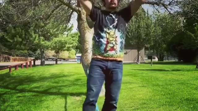 Man Kicks Bowl Into Another Bowl on His Head While Slacklining