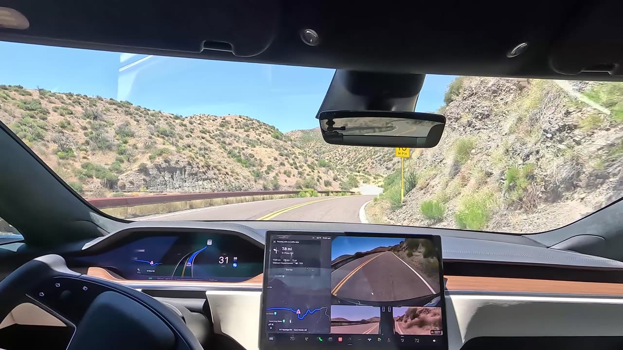 Tesla Full Self Driving Beta 11.4.3 FSD holding a curvy road