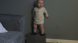 Climbing Kid Falls on Rear