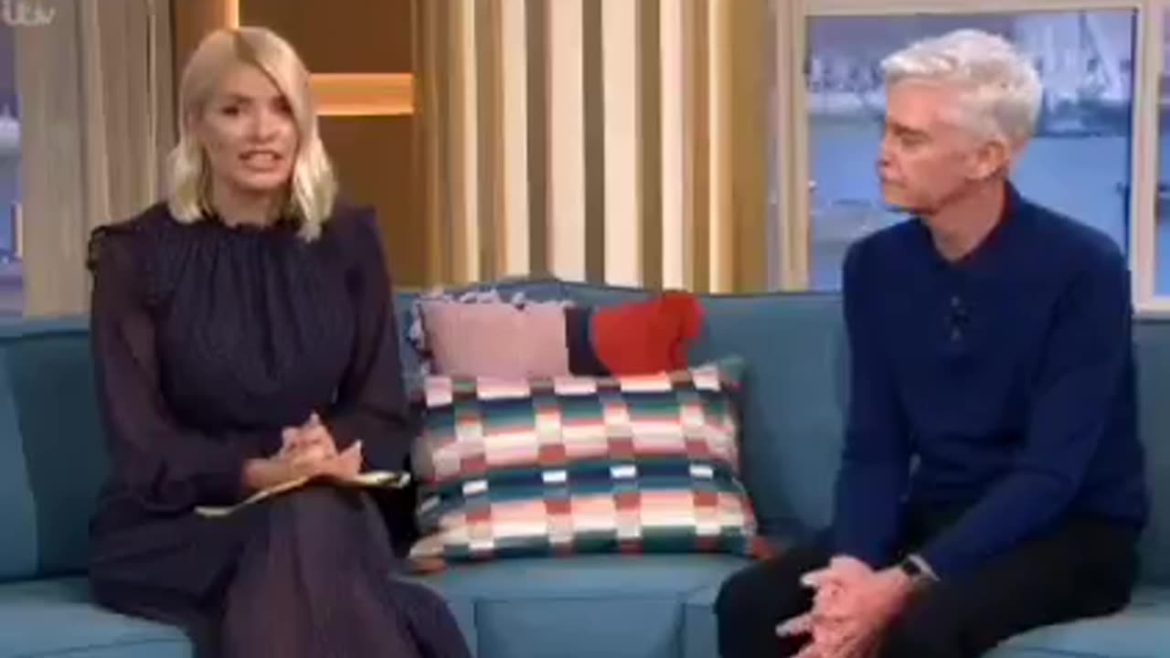 COVER UP = Phillip Schofield quits top UK morning show