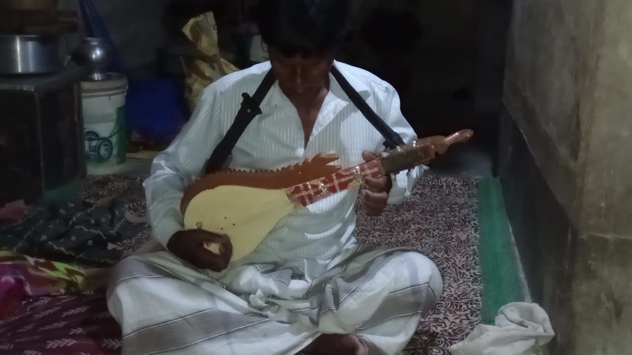 Village giter playing