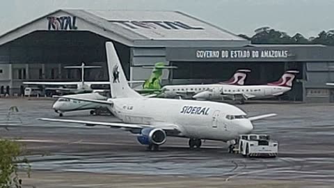 Boeing 737-300F PR-SLI be towed to Manaus International Airport cargo place