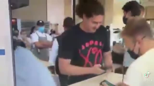 A man poses for a selfie with Justin Trudeau and calls him a..