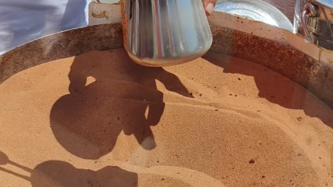 Turkish Coffee Brewed On Heated Desert Sand