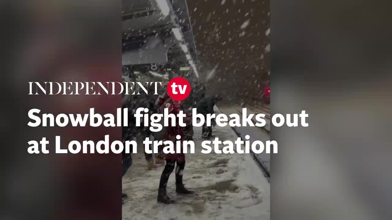 Snowball fight breaks out at London train station