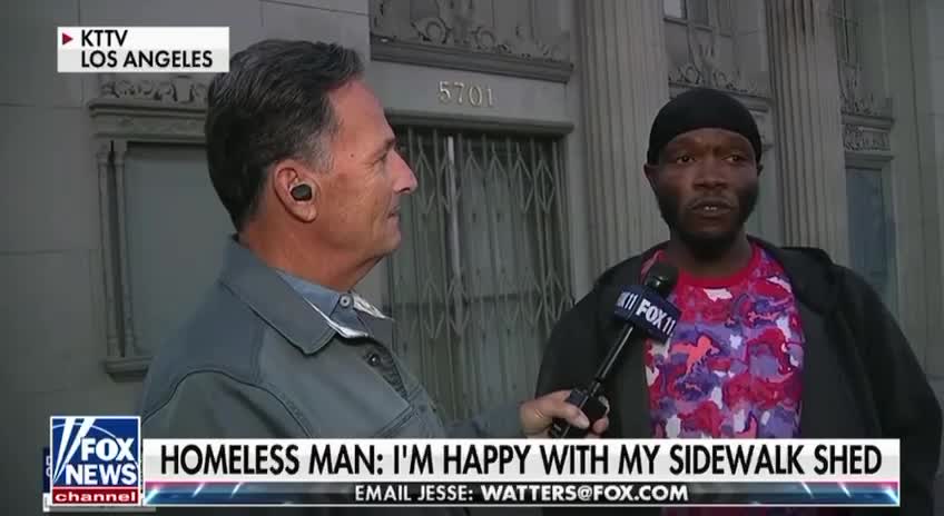 Homeless man named “Q” is happy with his sidewalk shed