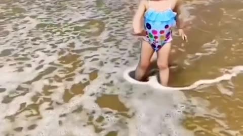 Baby in the sea very funny