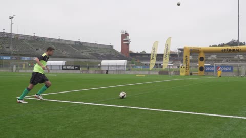 Guy Performs Brilliant Soccer Trick Shot by Consecutively Kicking Two Balls in Trashcan