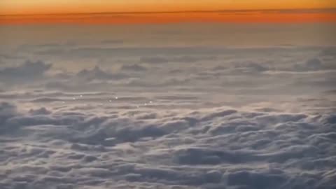 Over the Pacific Ocean, in Asia, from the cockpit of a