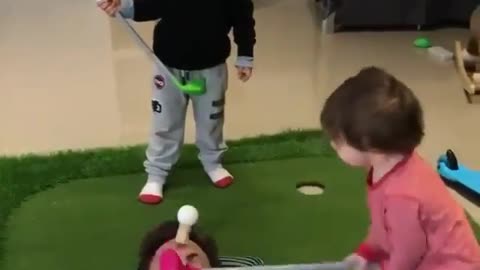 Children play golf.