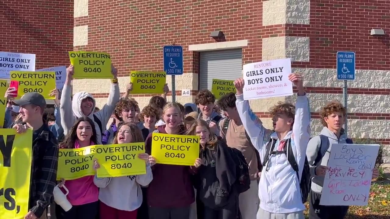 Students hold a large walkout to protest men being allowed in women’s bathrooms & locker rooms