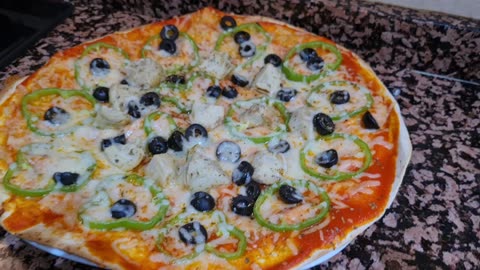 Pizza con pan de pita