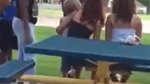 Black girl beats up white girl with a baby