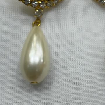 18KGP Faux Pearl Post Earrings. Made with Swarovski Crystal. Party. Event