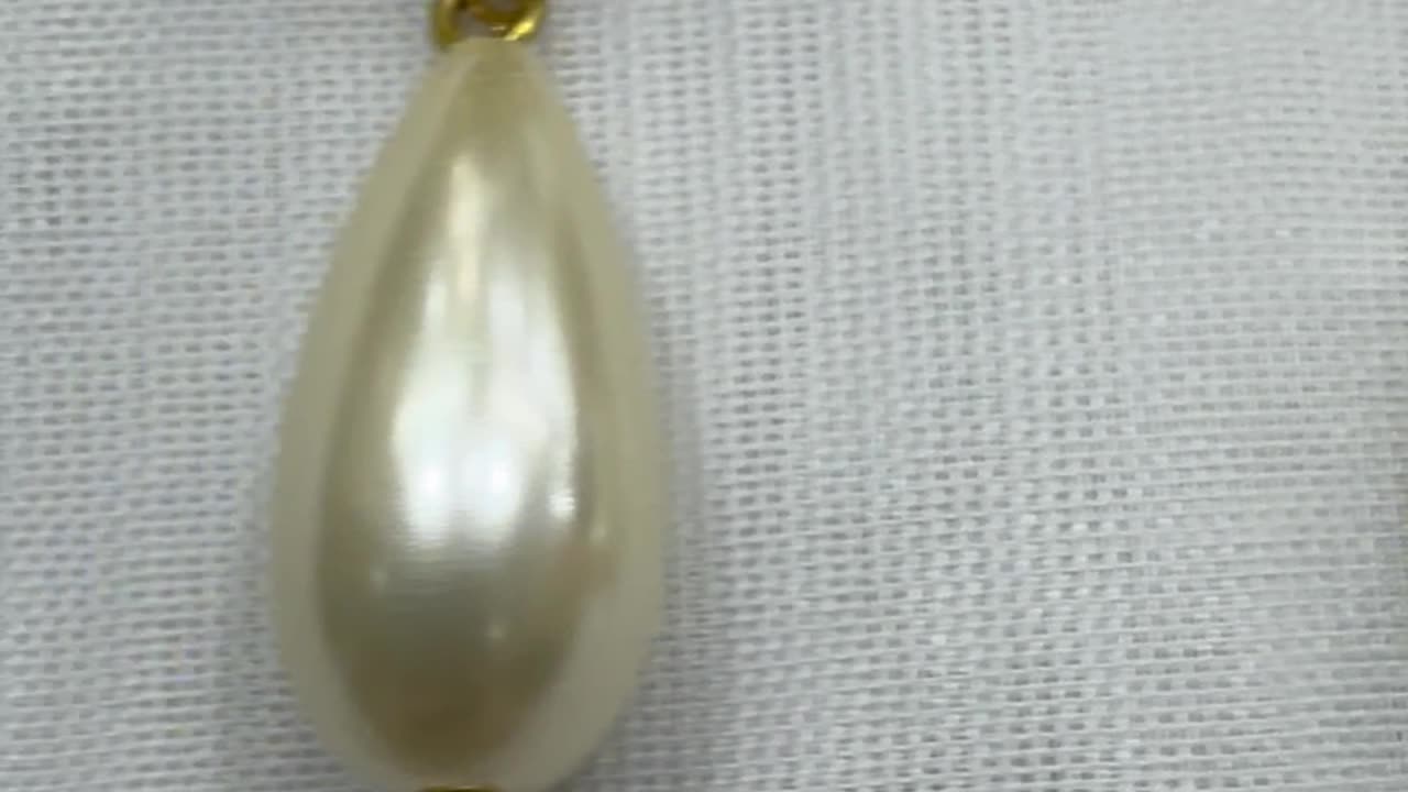 18KGP Faux Pearl Post Earrings. Made with Swarovski Crystal. Party. Event