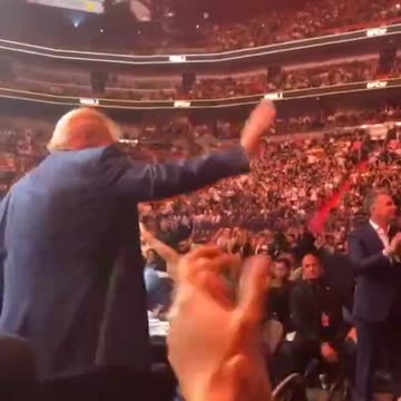 Crowds break out into patriotic chants as they see Trump at the UFC last night.