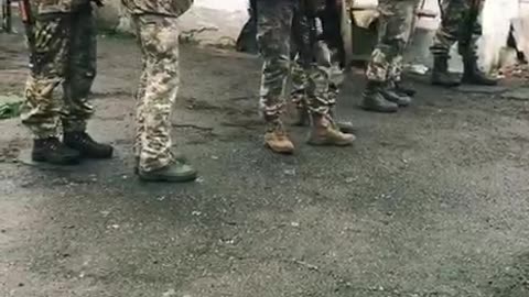 Dozens of Ukrainian Troops Move Out in the Morning