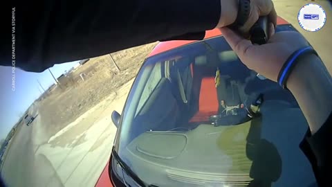Officer clings to the hood of suspects fleeing car, new video shows