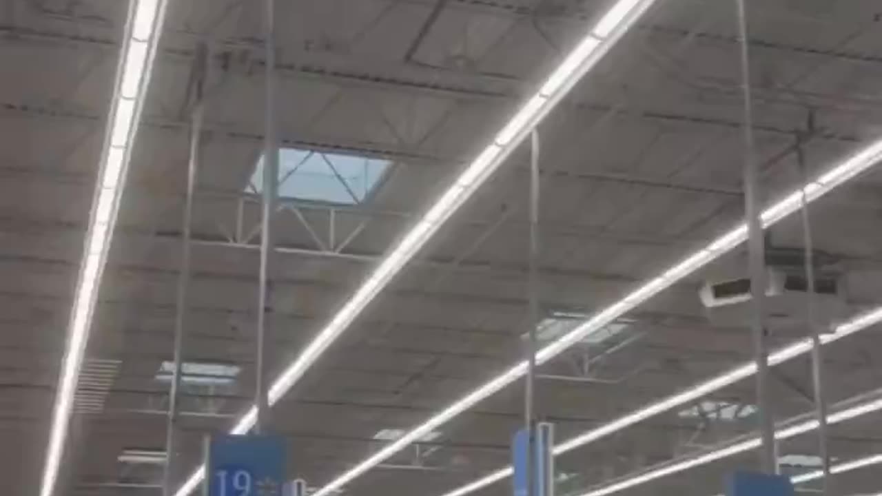 Hail Coming Through The Roof at a WALMART in North Texas!