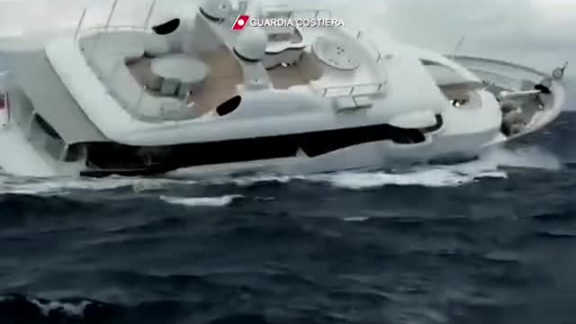 This is the dramatic moment a luxury yacht sinks off the coast of Italy