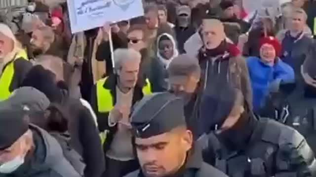 Police Join Protesters in Paris