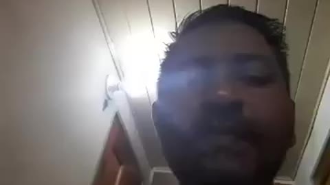 Vaccinated man turns on light with his arm...