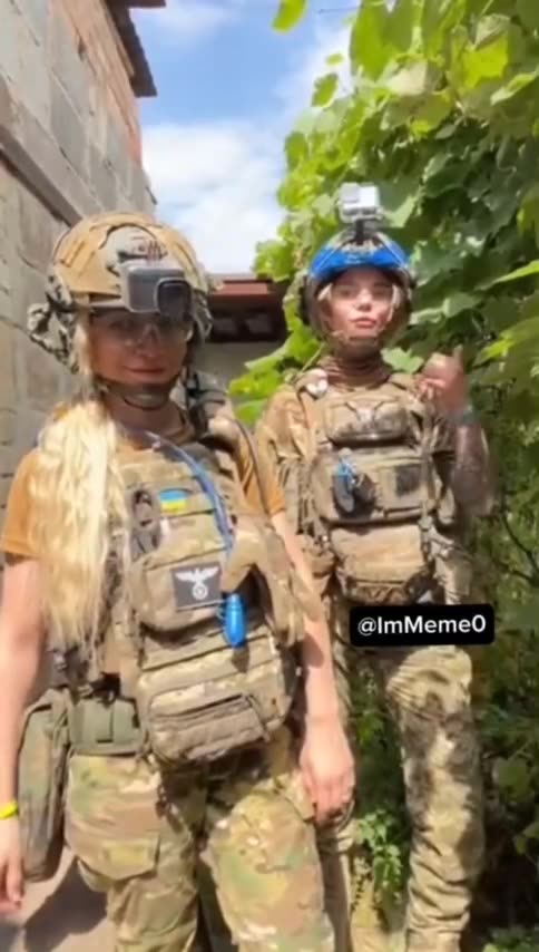 Very young Ukrianian soliders, one with Nazi patch