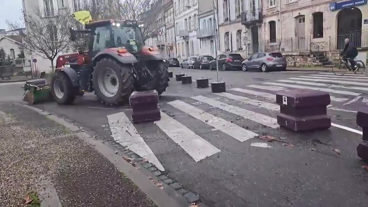 French farmers protesting the government have equipped their tractors with makeshift rams