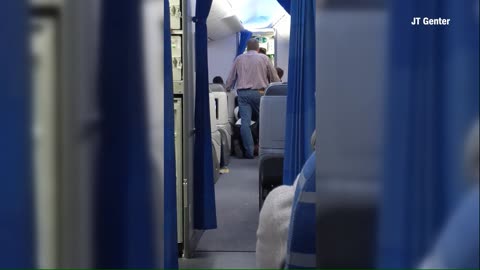 Airline passenger arrested over alleged attempt to storm cockpit