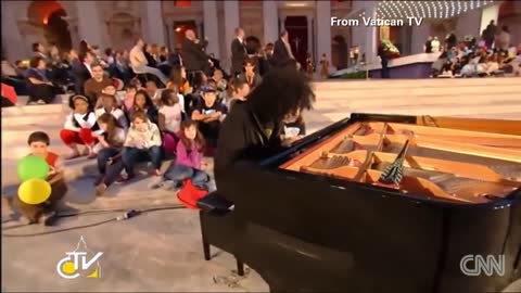 Little boy steals the show from the Pope_1