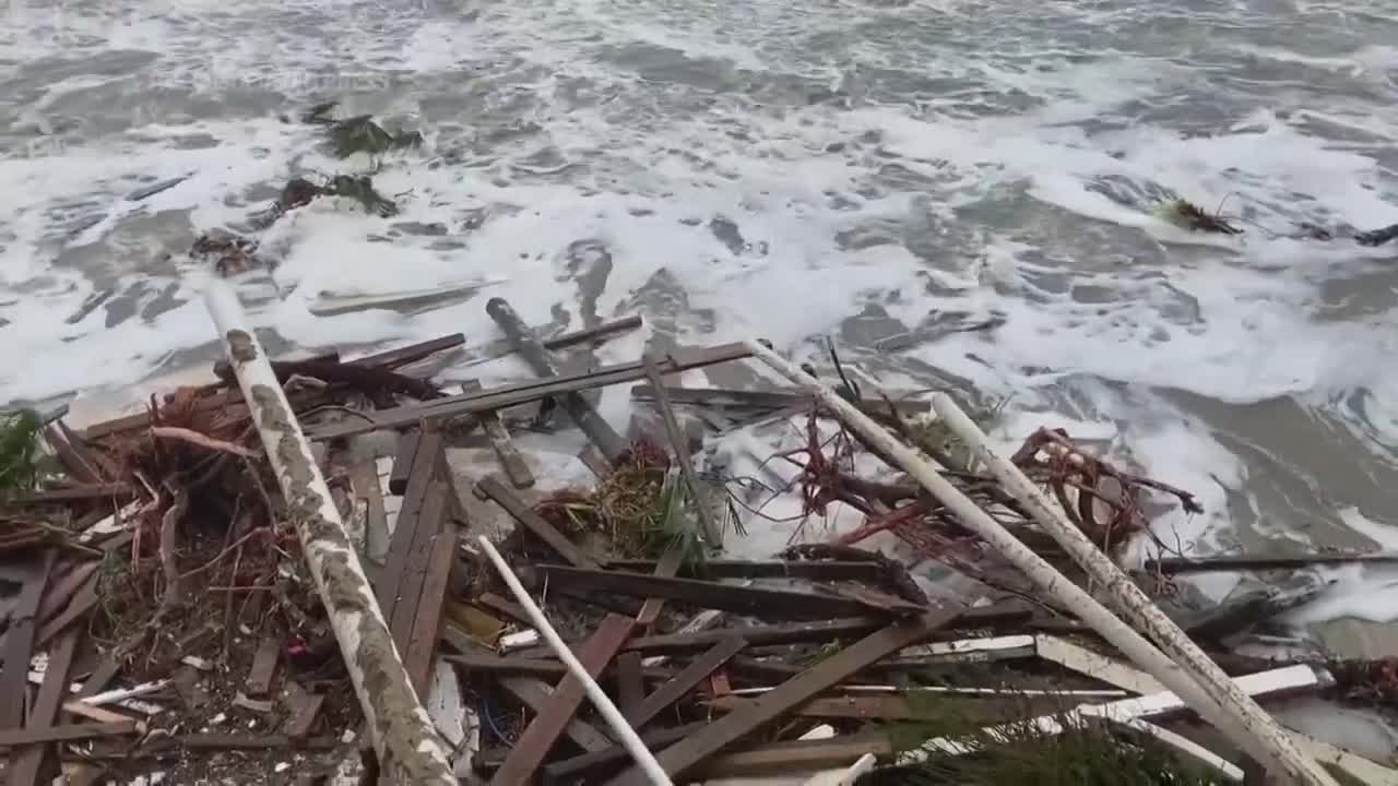 Tropical Storm Nicole topples beachfront homes