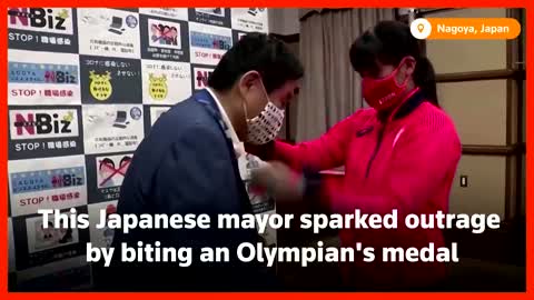 Olympian gets new medal after local mayor bites hers