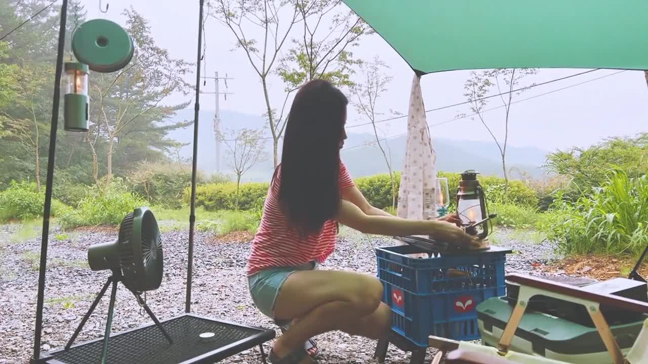 One person camping in rainy days, enjoy one's time