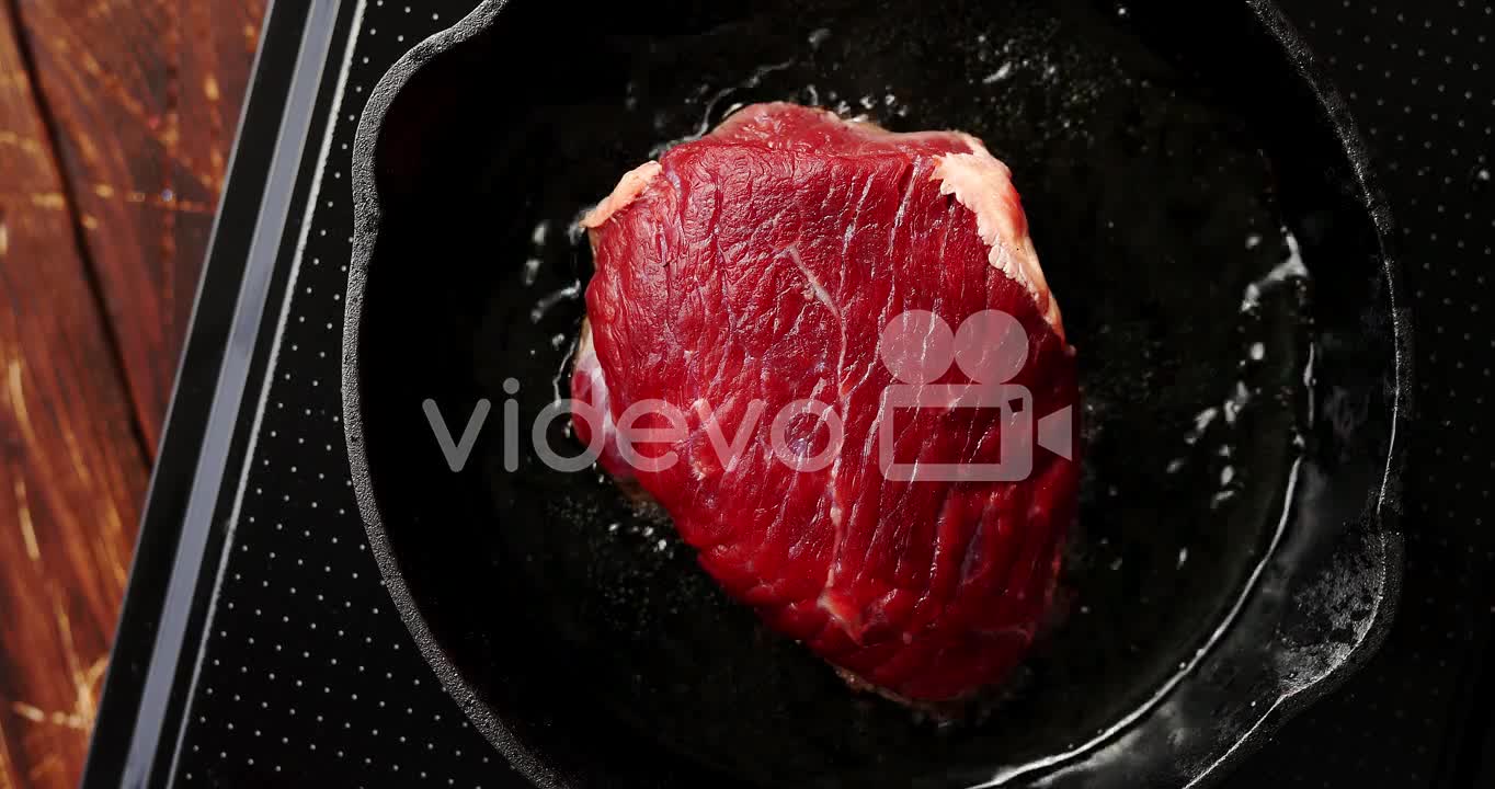 Big piece of meat on pan