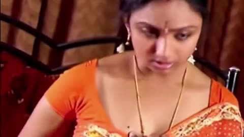 Hot Indian aunty in orange saree