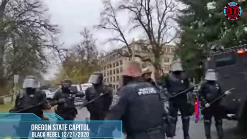 Salem Rally Ends With A Broken Window And AntiFa Filmers Getting Saved By Villain H_T Black Rebel