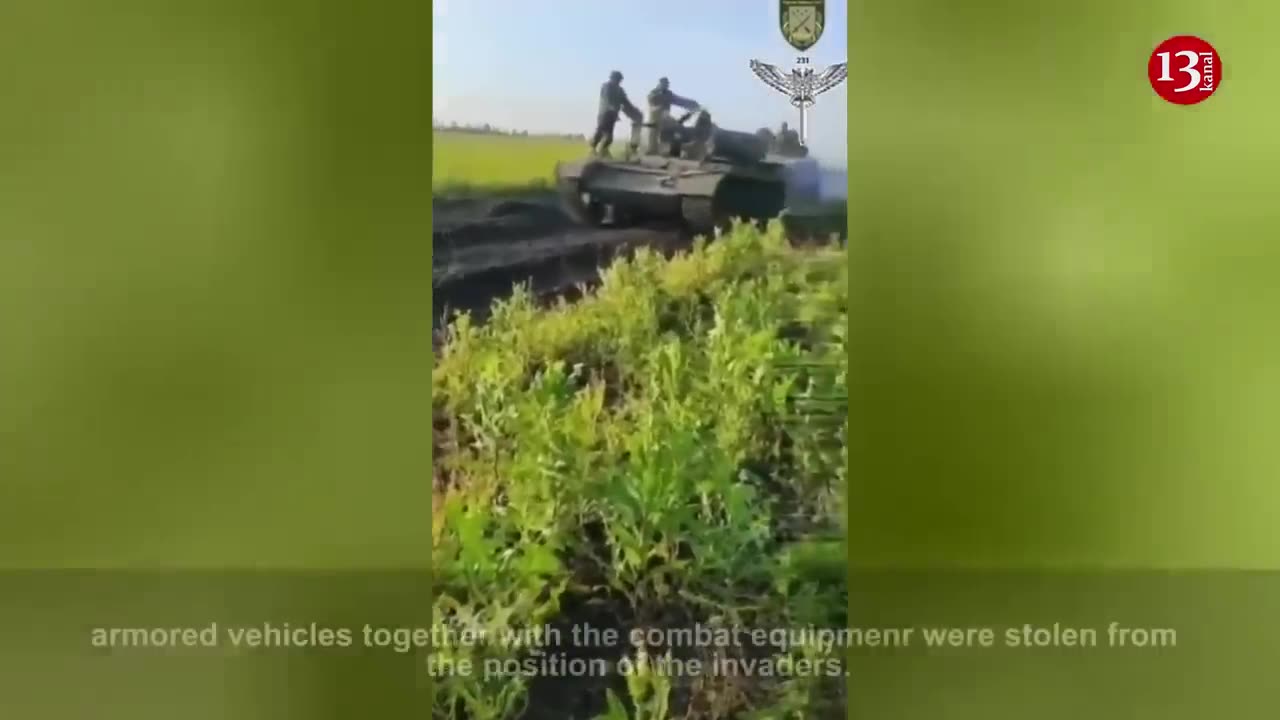 Ukrainian soldiers parade Russian invaders’ armored fighting vehicle that they captured