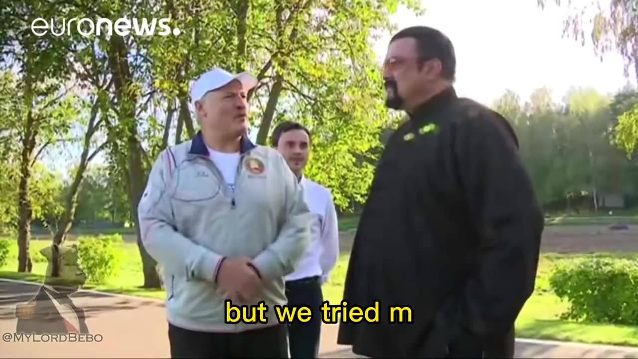 Lukashenko feeding Steven Seagal with a carrot