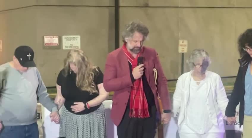 Professor Clement Leads Prayer