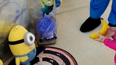 Houston mascot party character minion plays the banana target game in Humble, Texas at a birthday