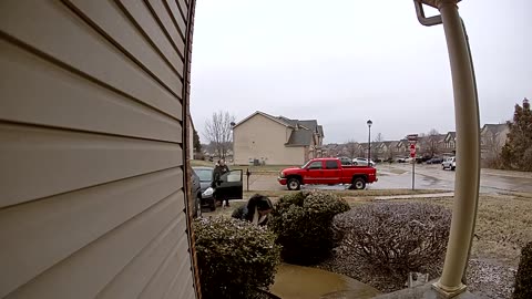 Girl Laughs As Mom Slides Down Sidewalk