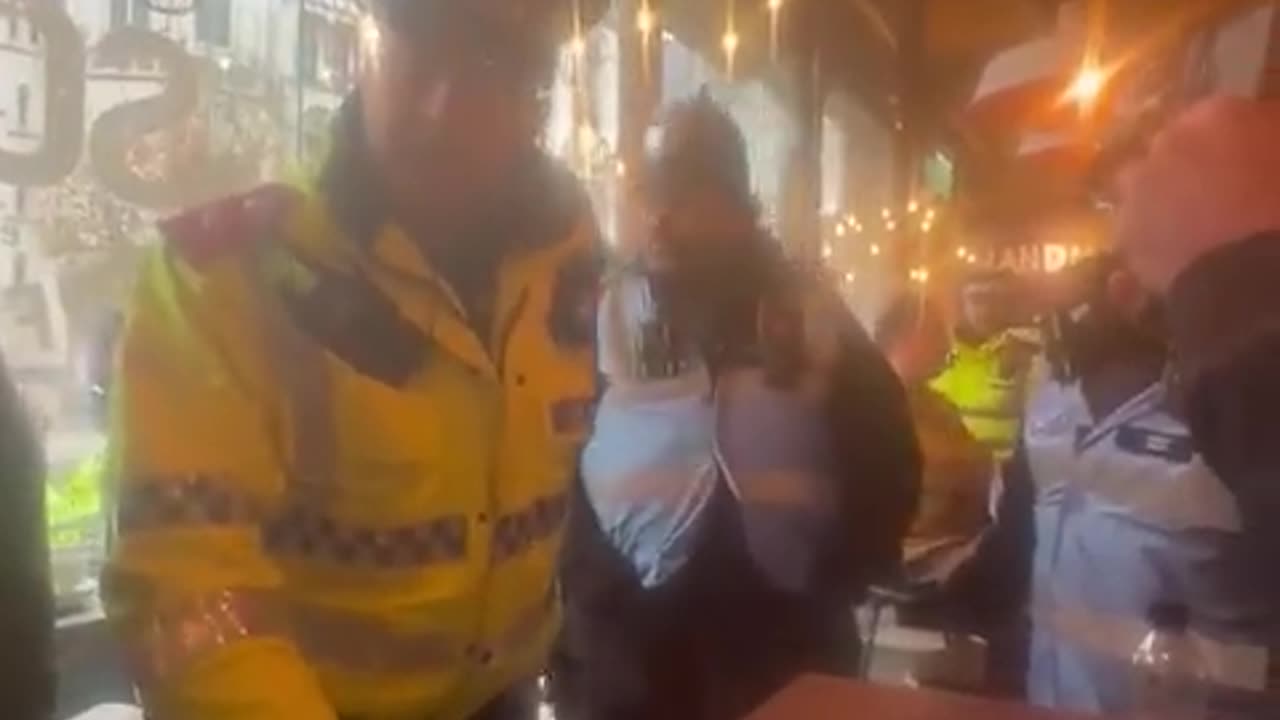 Police harass Tommy Robinson while he is eating breakfast