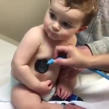 The sweet little boy, reclines his head in the nurse's hand, how cute! Hilarious people Memes-66