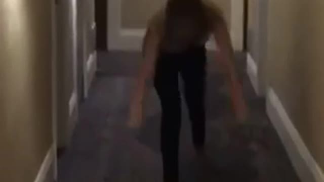Girl failed flip hotel hall