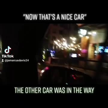 Driving Pass A Nice Car