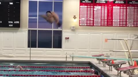 Red scoreboard indoor dive bellyflop