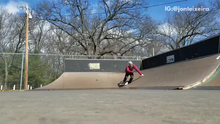 Two angle red shirt kid jumps ramp and slams into quarterpipe