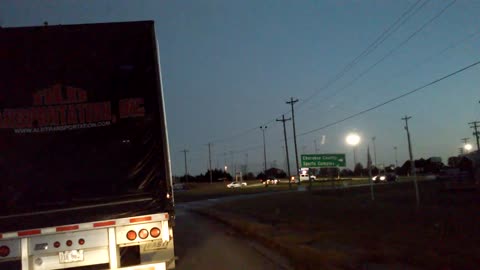 Dizzy Peckerhead trucker of the day aimlessly riding around at night with no lights.