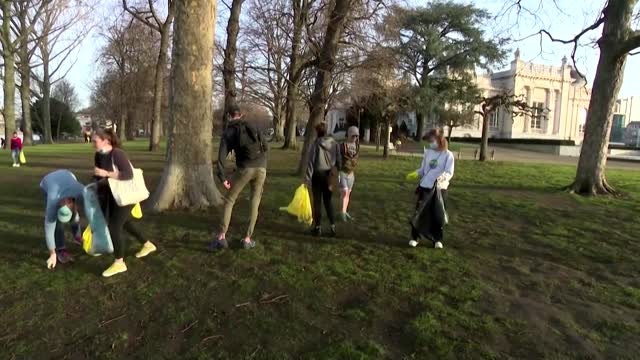 Crowds defy restrictions, party in Belgian park